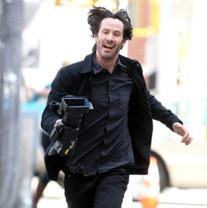 Keanu Reeves running through the Streets of NYC