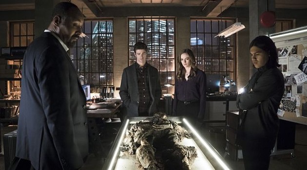 Barry, Joe, Caitlin, and Cisco with Harrison Wells' remains