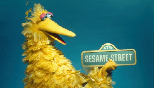 Big Bird with Sesame Street sign