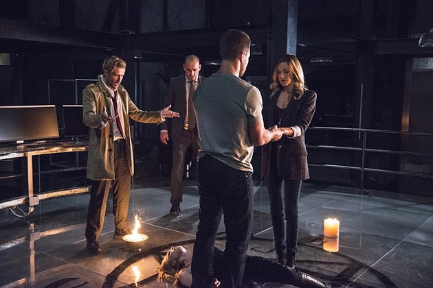 Constantine, Ollie and Laurel perform the ritual