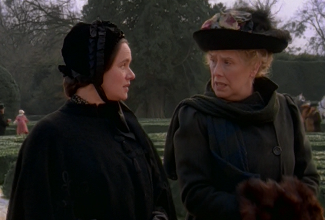 Governess Emilie (Pernilla August) and Miss Seymour